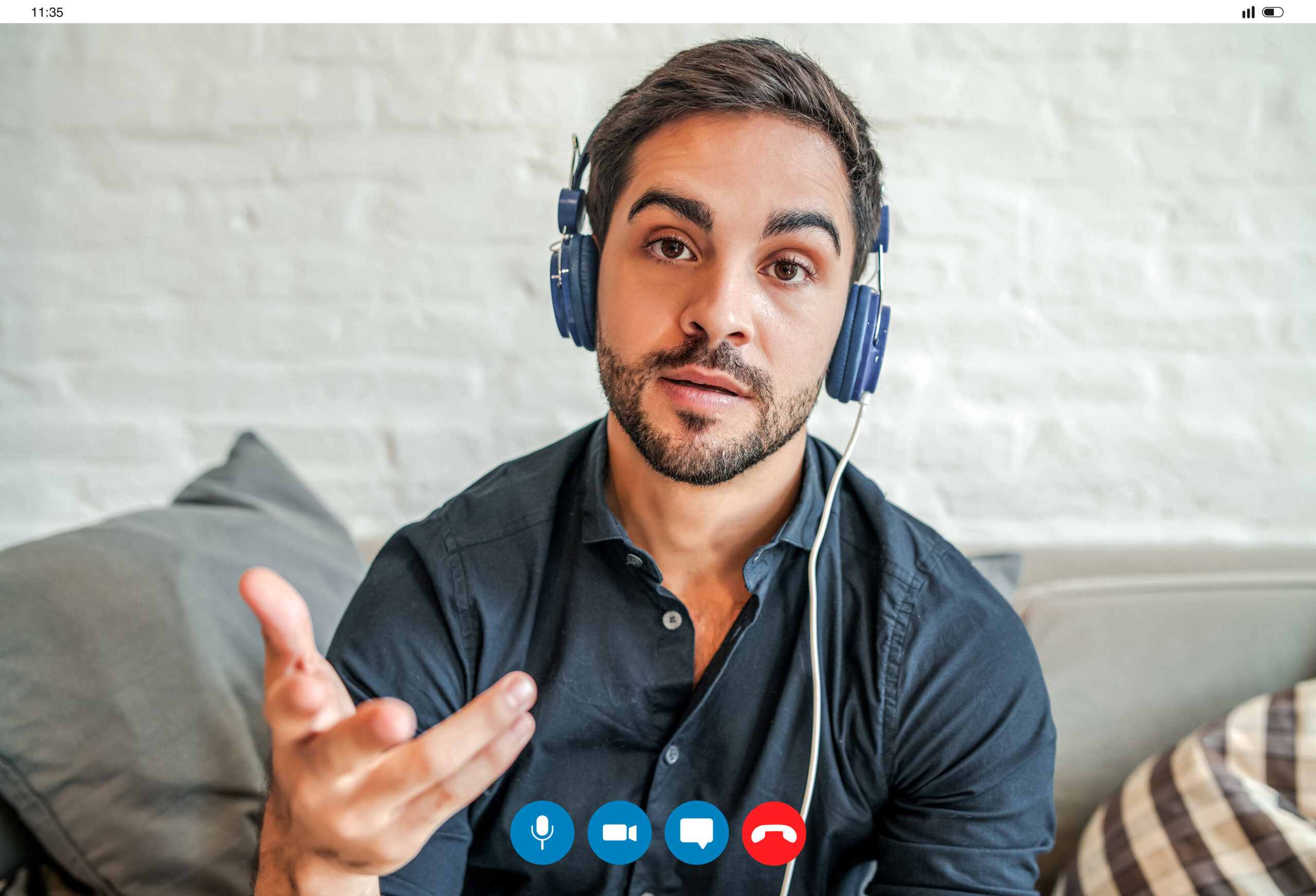 young businessman on a work video call while staying at home.